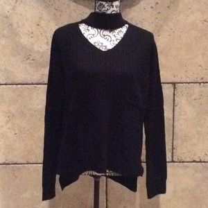 Beautiful black sweater with distressed look